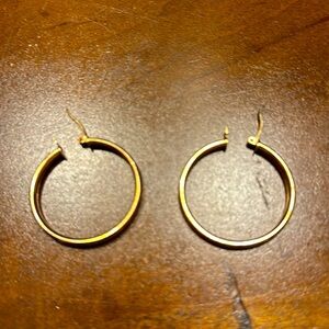 925 golden hoop women’s earrings.